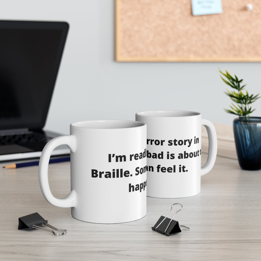 "I’m reading a horror story in Braille. Something bad is about to happen… I can feel it." white mug