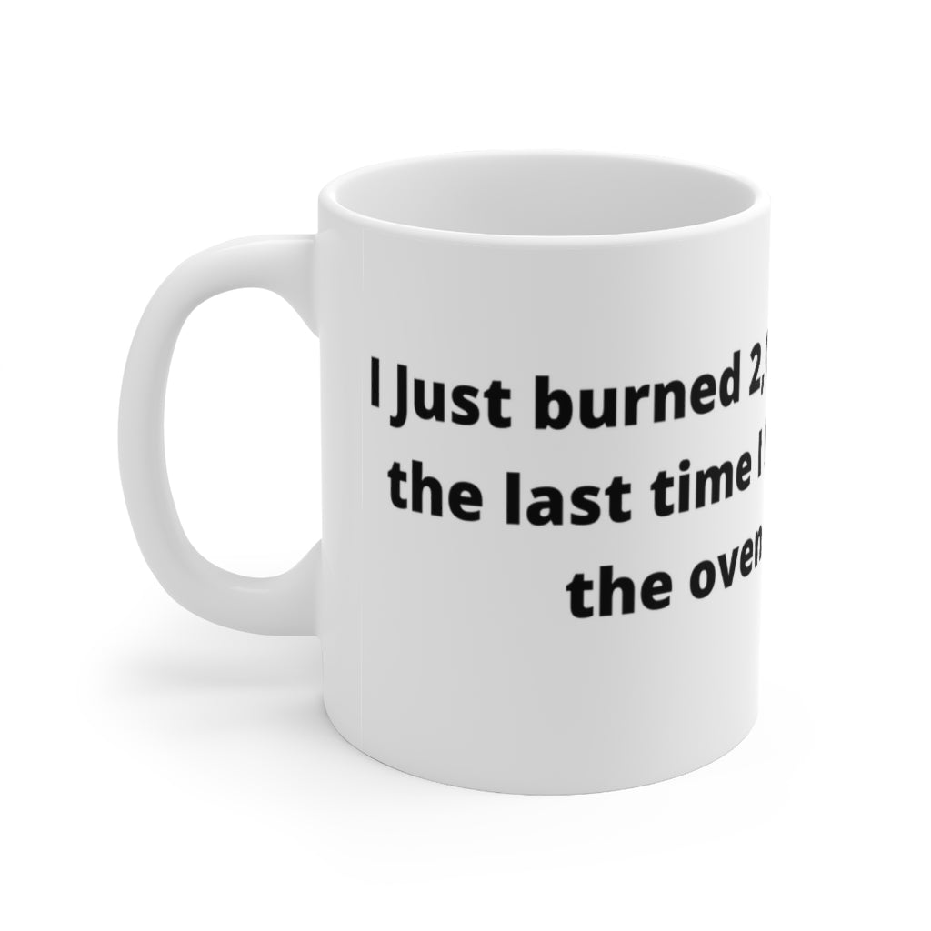 "I Just burned 2,000 calories. That’s the last time I leave brownies in the oven while I nap." white mug